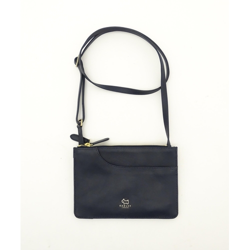 1402 - Vintage fashion / clothing: A Radley navy leather Pocket crossbody bag. Approx. 8 1/2