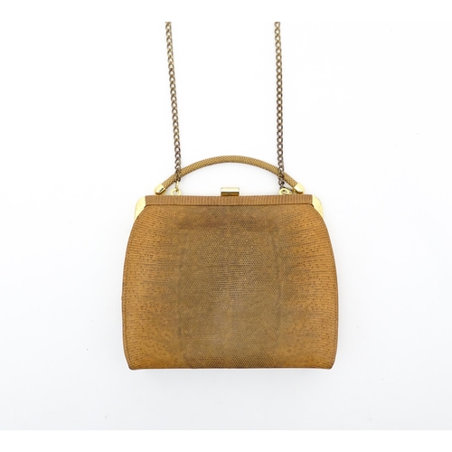 1403 - Vintage fashion / clothing: A brown lizard skin handbag with tan suede lining. Together with a snake... 