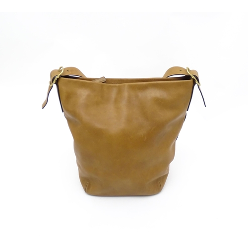 1405 - Vintage fashion / clothing: A Coach tan leather vintage legacy shoulder bag with monogram lining. Co... 