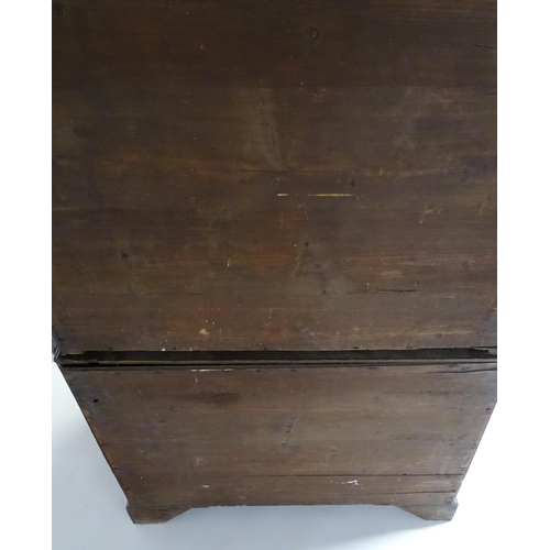 1586 - A late 18thC mahogany chest on chest with a moulded cornice above two short over six long graduated ... 