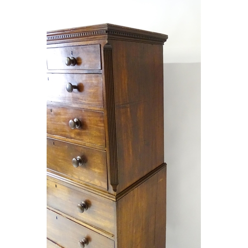 1586 - A late 18thC mahogany chest on chest with a moulded cornice above two short over six long graduated ... 