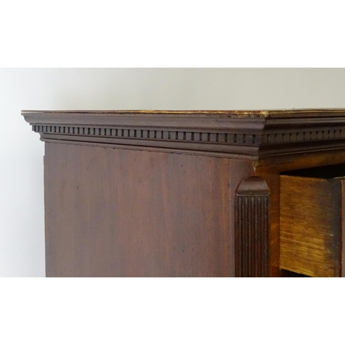 1586 - A late 18thC mahogany chest on chest with a moulded cornice above two short over six long graduated ... 