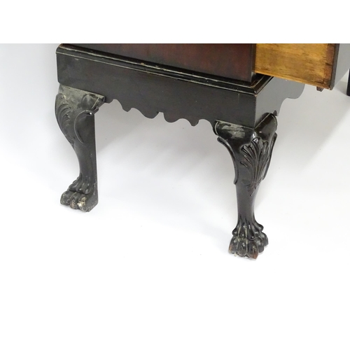 1587 - An 18thC and later mahogany chest on stand with a Greek Key moulded cornice above six graduated draw... 