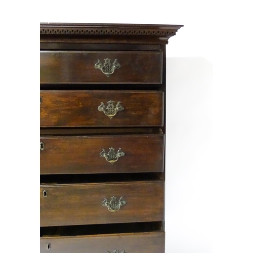 1587 - An 18thC and later mahogany chest on stand with a Greek Key moulded cornice above six graduated draw... 