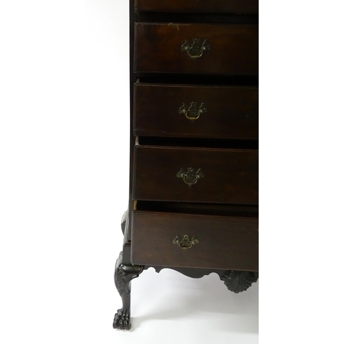 1587 - An 18thC and later mahogany chest on stand with a Greek Key moulded cornice above six graduated draw... 