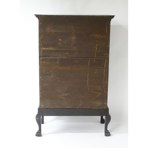 1587 - An 18thC and later mahogany chest on stand with a Greek Key moulded cornice above six graduated draw... 