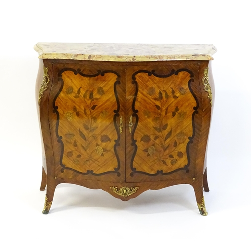 1590 - A late 19thC marble topped commode with brass mounts and two marquetry inlaid doors raised on four t... 