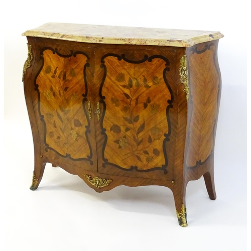 1590 - A late 19thC marble topped commode with brass mounts and two marquetry inlaid doors raised on four t... 