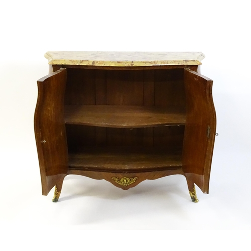 1590 - A late 19thC marble topped commode with brass mounts and two marquetry inlaid doors raised on four t... 