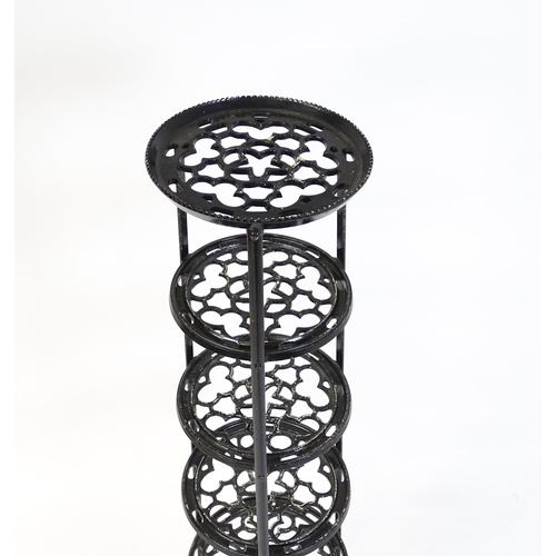 1624 - A 20thC six tier graduated pot stand with pierced decoration. 48