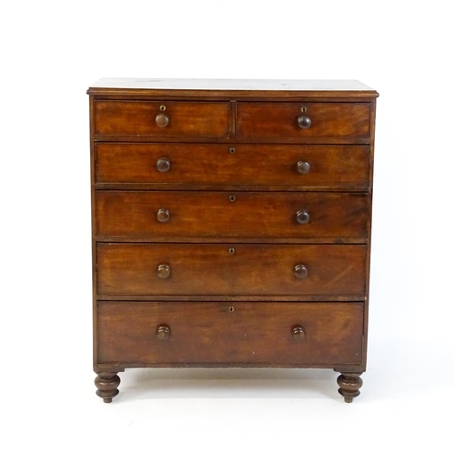 1640 - A Victorian mahogany chest of drawers with a moulded top above two short over four long drawers rais... 