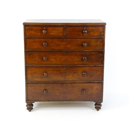 1640 - A Victorian mahogany chest of drawers with a moulded top above two short over four long drawers rais... 