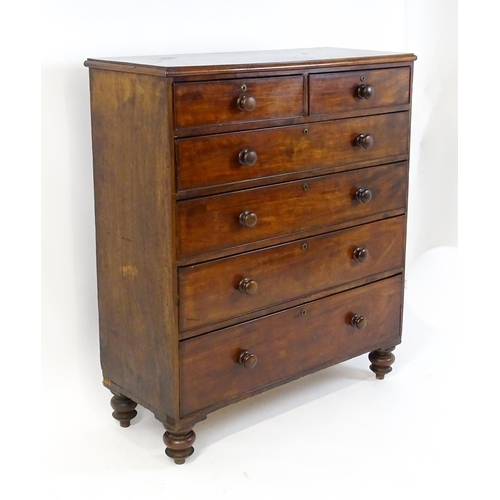 1640 - A Victorian mahogany chest of drawers with a moulded top above two short over four long drawers rais... 