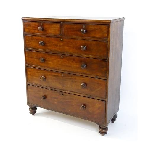 1640 - A Victorian mahogany chest of drawers with a moulded top above two short over four long drawers rais... 