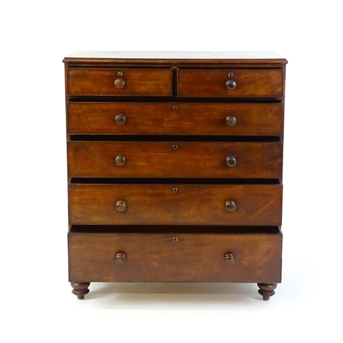 1640 - A Victorian mahogany chest of drawers with a moulded top above two short over four long drawers rais... 