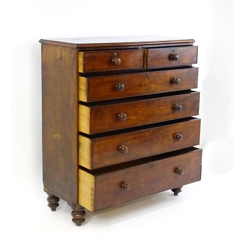 1640 - A Victorian mahogany chest of drawers with a moulded top above two short over four long drawers rais... 