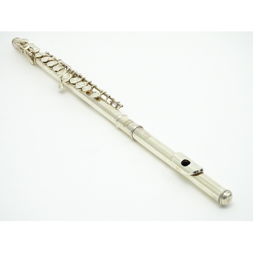 1365 - Musical Instrument : a Yamaha model 211SII flute , serial number 528126, with additional youth headj... 