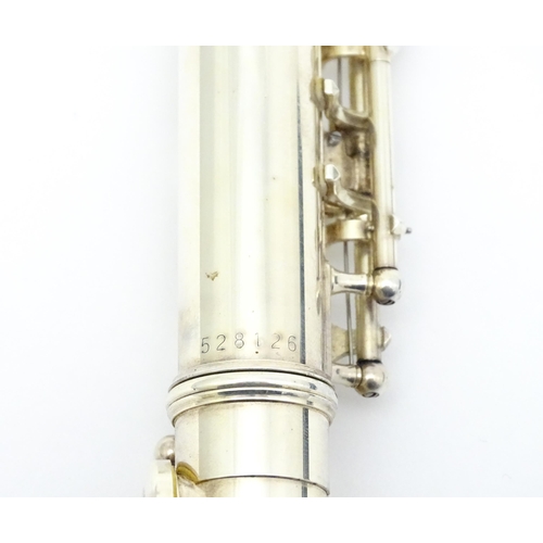 1365 - Musical Instrument : a Yamaha model 211SII flute , serial number 528126, with additional youth headj... 