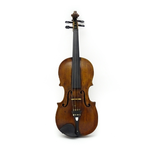 1376 - Musical Instrument: an early 19thC violin, the interior bearing labels 'Repaired by H. Pickard 137 K... 