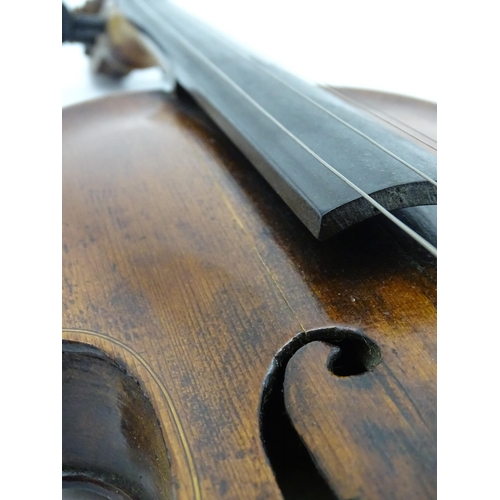 1376 - Musical Instrument: an early 19thC violin, the interior bearing labels 'Repaired by H. Pickard 137 K... 