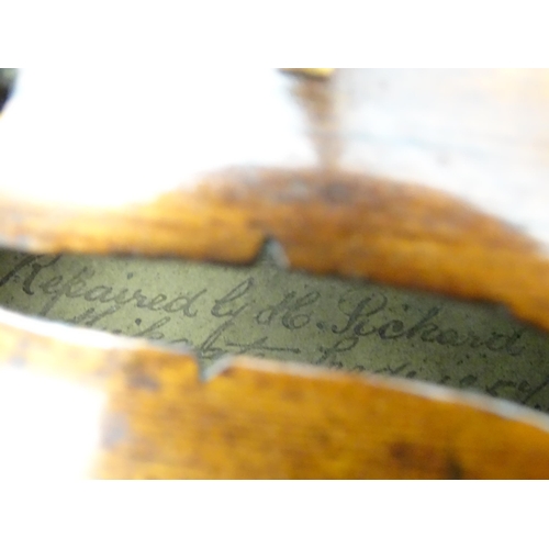 1376 - Musical Instrument: an early 19thC violin, the interior bearing labels 'Repaired by H. Pickard 137 K... 