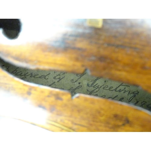 1376 - Musical Instrument: an early 19thC violin, the interior bearing labels 'Repaired by H. Pickard 137 K... 