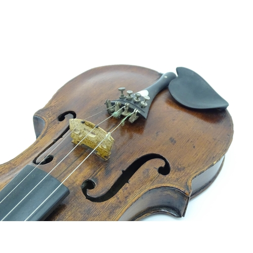 1376 - Musical Instrument: an early 19thC violin, the interior bearing labels 'Repaired by H. Pickard 137 K... 