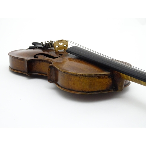 1376 - Musical Instrument: an early 19thC violin, the interior bearing labels 'Repaired by H. Pickard 137 K... 