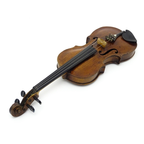 1376 - Musical Instrument: an early 19thC violin, the interior bearing labels 'Repaired by H. Pickard 137 K... 