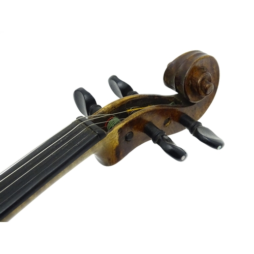 1376 - Musical Instrument: an early 19thC violin, the interior bearing labels 'Repaired by H. Pickard 137 K... 