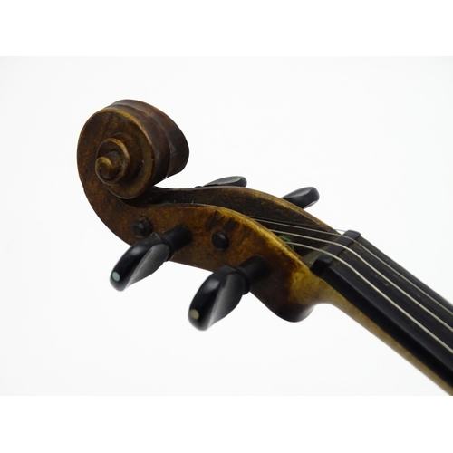 1376 - Musical Instrument: an early 19thC violin, the interior bearing labels 'Repaired by H. Pickard 137 K... 