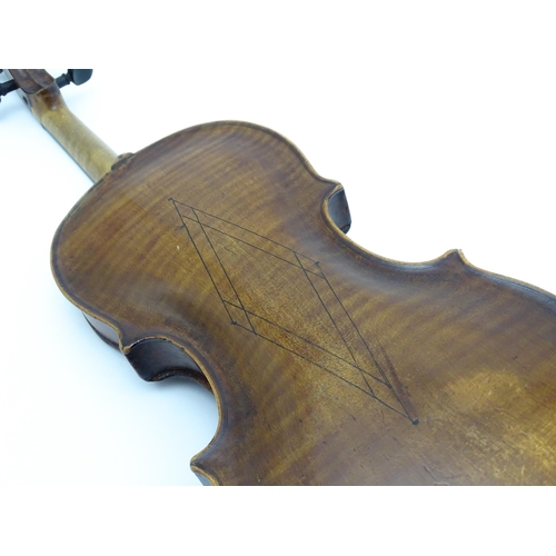 1376 - Musical Instrument: an early 19thC violin, the interior bearing labels 'Repaired by H. Pickard 137 K... 