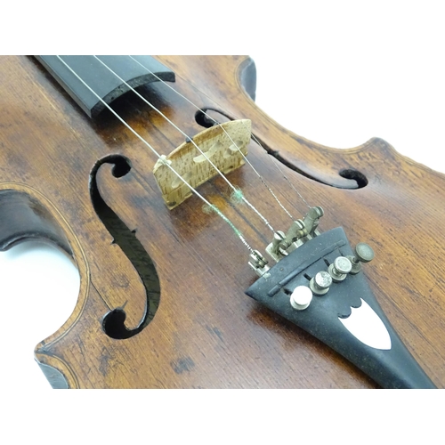 1376 - Musical Instrument: an early 19thC violin, the interior bearing labels 'Repaired by H. Pickard 137 K... 