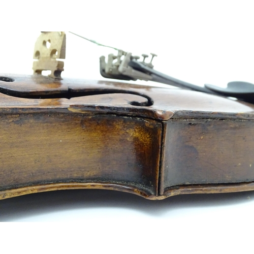 1376 - Musical Instrument: an early 19thC violin, the interior bearing labels 'Repaired by H. Pickard 137 K... 