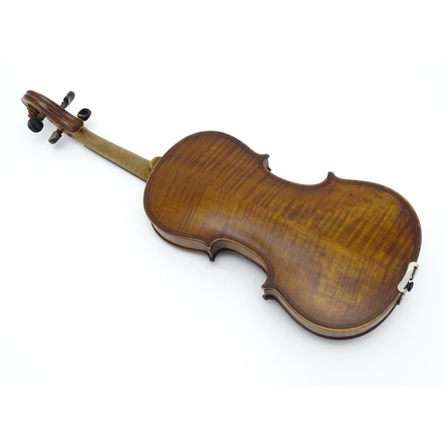 1377 - Musical Instrument: an early 20thC continental violin, constructed from maple with mahogany tuning p... 