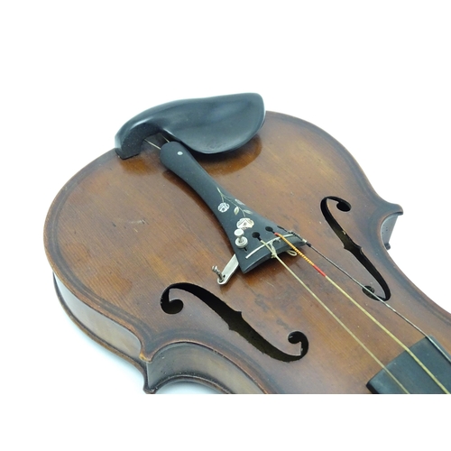 1377 - Musical Instrument: an early 20thC continental violin, constructed from maple with mahogany tuning p... 