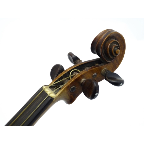 1377 - Musical Instrument: an early 20thC continental violin, constructed from maple with mahogany tuning p... 