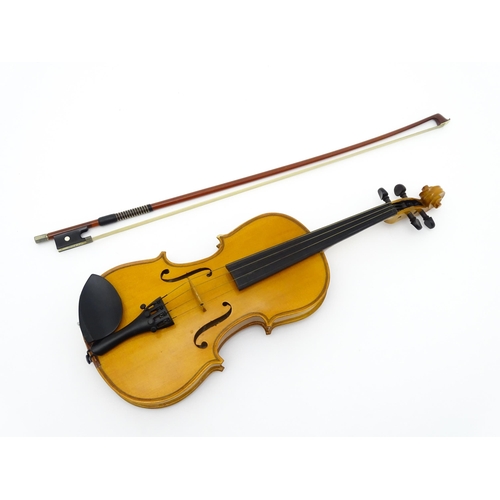 1378 - Musical Instrument: a late 20thC student 3/4 scale violin, bearing interior label 'The Buckingham Vi... 