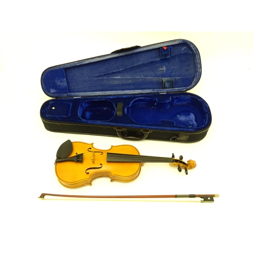 1378 - Musical Instrument: a late 20thC student 3/4 scale violin, bearing interior label 'The Buckingham Vi... 