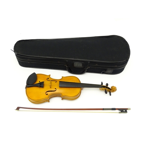 1378 - Musical Instrument: a late 20thC student 3/4 scale violin, bearing interior label 'The Buckingham Vi... 