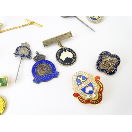 773 - Trade Union Interest: a quantity of assorted badges, pins, etc. to include two sterling silver Plumb... 