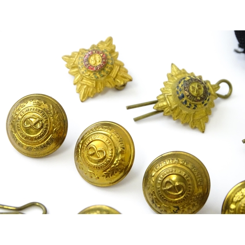 809 - Militaria : a quantity of North Staffordshire Regiment insignia, comprising a pair of collar badges ... 