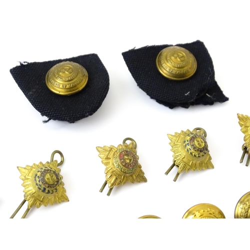 809 - Militaria : a quantity of North Staffordshire Regiment insignia, comprising a pair of collar badges ... 