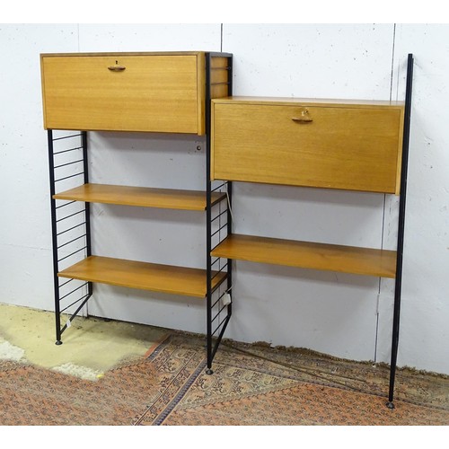 1752 - A mid-20thC Staples Ladderax modular shelving system, comprising two drop-front cabinets with sectio... 