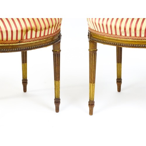 1696 - A pair of early 20thC lyre back side chairs with upholstered seats, on fluted legs. Approx. 32 1/2” ... 