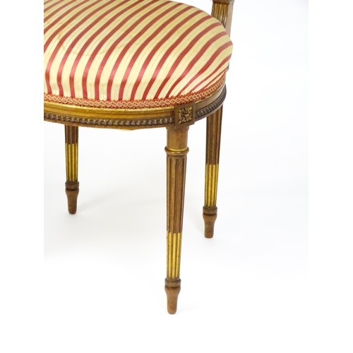 1696 - A pair of early 20thC lyre back side chairs with upholstered seats, on fluted legs. Approx. 32 1/2” ... 