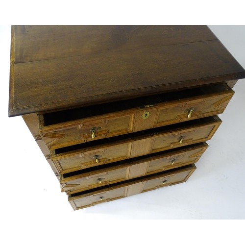 1697 - A late 17thC oak chest of drawers with a rectangular top above four graduated drawers with geometric... 