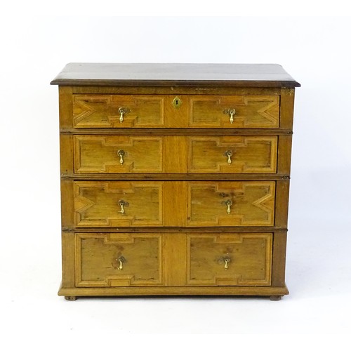 1697 - A late 17thC oak chest of drawers with a rectangular top above four graduated drawers with geometric... 