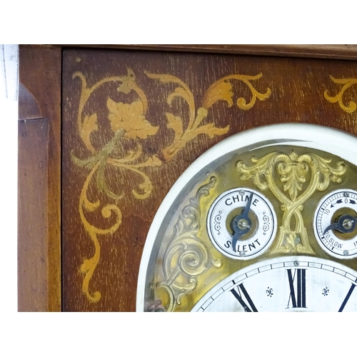 1493 - An early 20thC German 8 day mantel clock by Junghans, the case with inlaid detail. Approx. 16 3/4