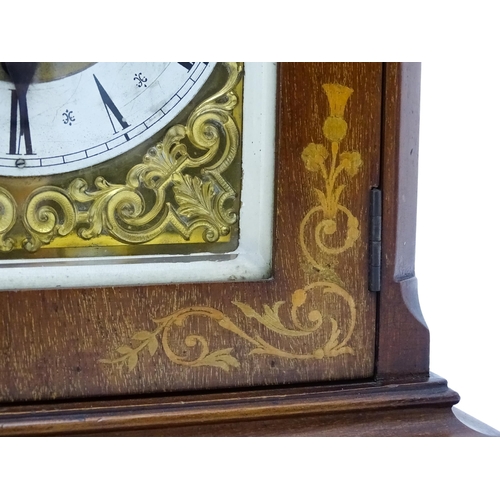 1493 - An early 20thC German 8 day mantel clock by Junghans, the case with inlaid detail. Approx. 16 3/4